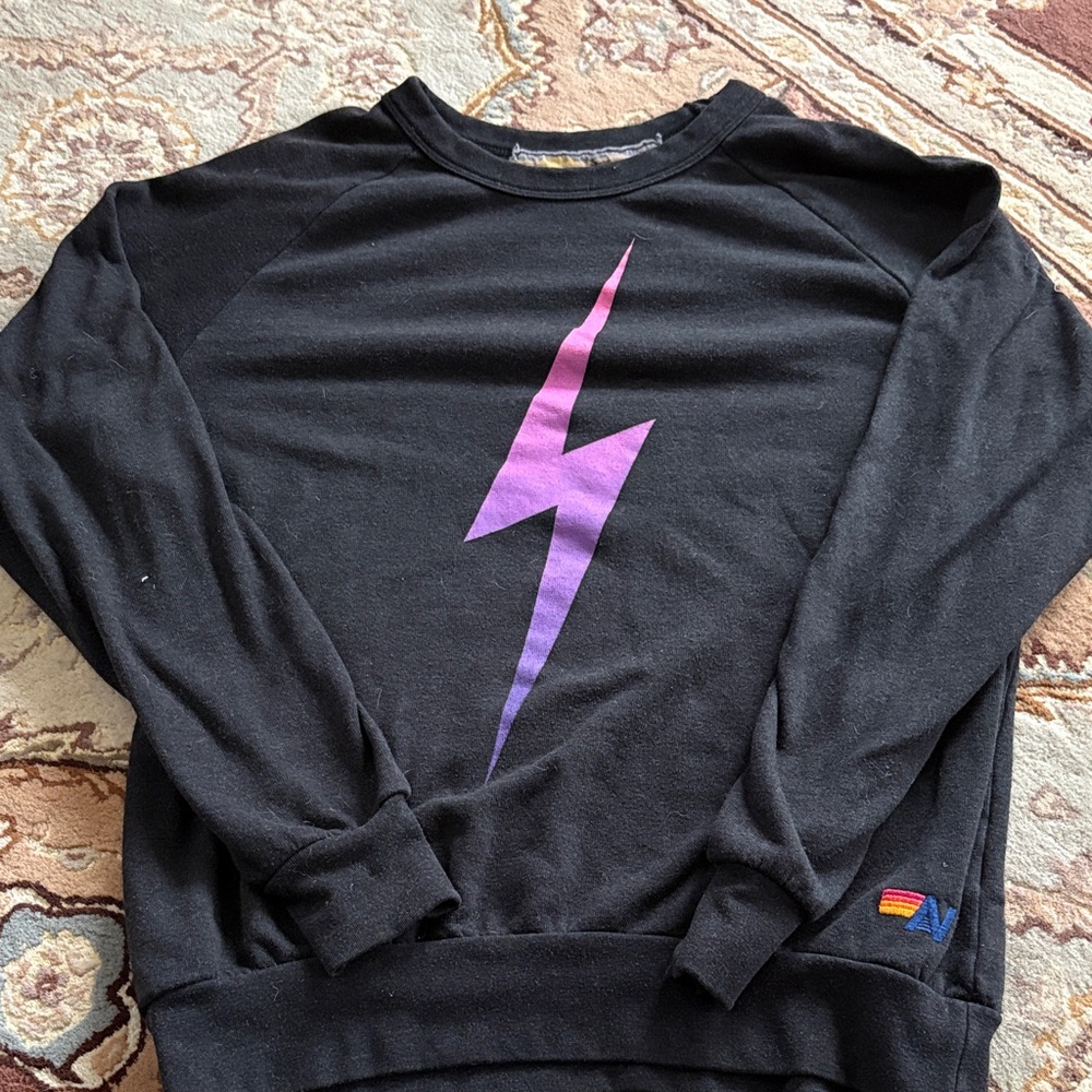 Aviator Nation Black Crewneck Sweatshirt with Purple Lightning Graphic